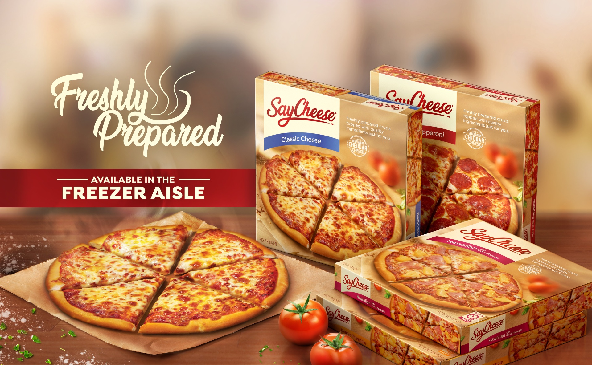 Say Cheese freshly prepared pizza with product boxes, available in the freezer aisle
